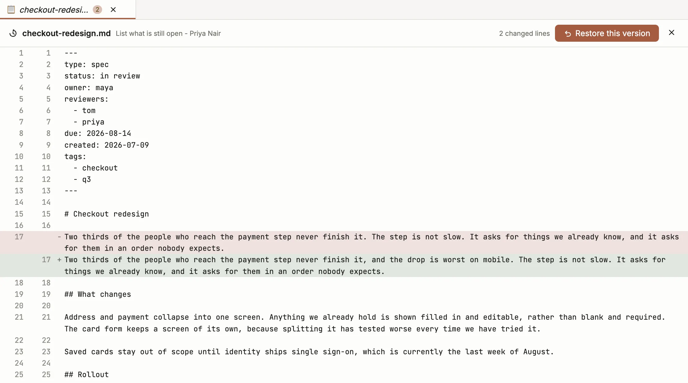 A revision shown as two changed lines, one red and one green, in the document itself.